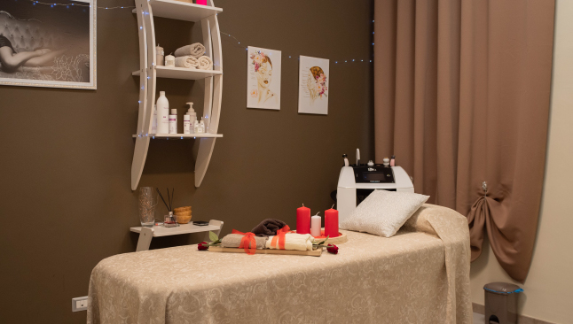 Beauty center cabin with cot and red candles